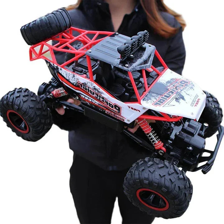 Monster truck télécommandé, jouet à l’échelle 1:12, véhicule tout-terrain 4WD avec amortisseurs et commande rotative, cadeau idéal pour les enfants à partir de 4 ans | Sulvida