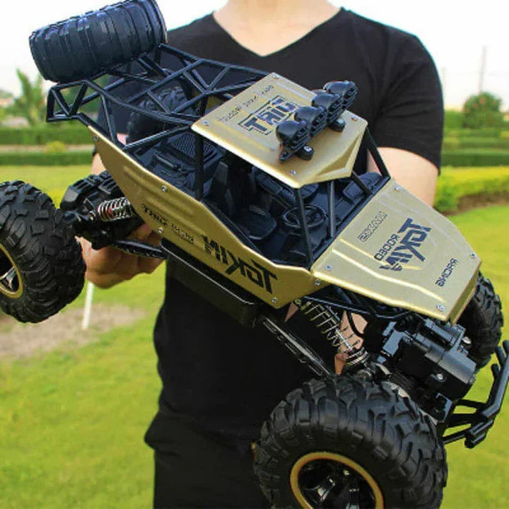 Monster truck télécommandé, jouet à l’échelle 1:12, véhicule tout-terrain 4WD avec amortisseurs et commande rotative, cadeau idéal pour les enfants à partir de 4 ans | Sulvida