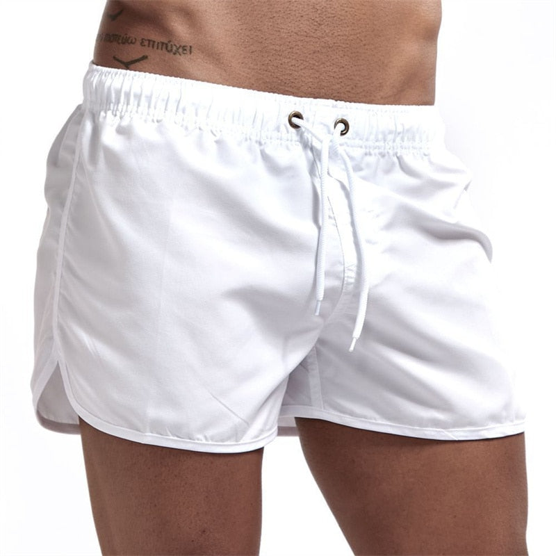 Short de bain pour hommes uni avec poche et cordon réglable – Maillot de bain à séchage rapide pour la plage et la piscine – Vêtement d’été confortable | Sulvida