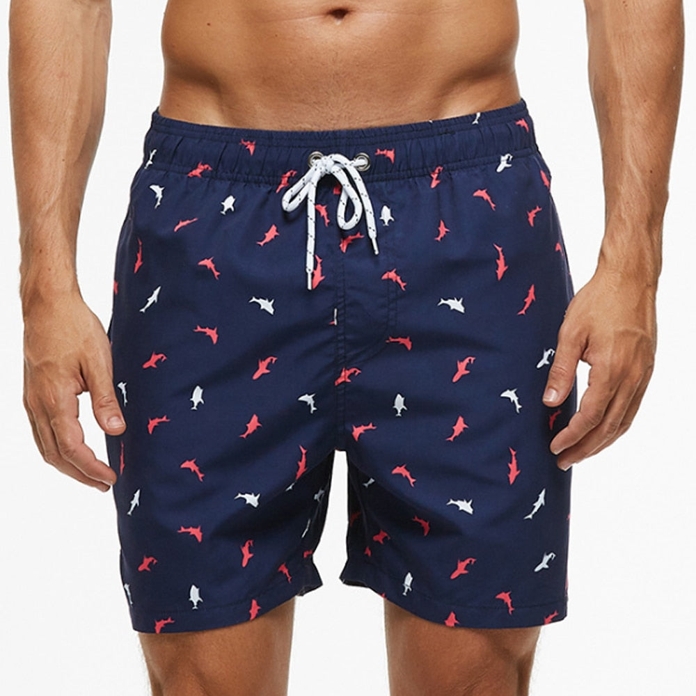 Short de bain pour hommes avec imprimé tropical et cordon réglable – Short de plage à séchage rapide en 9 variantes pour l’été et les vacances | Sulvida